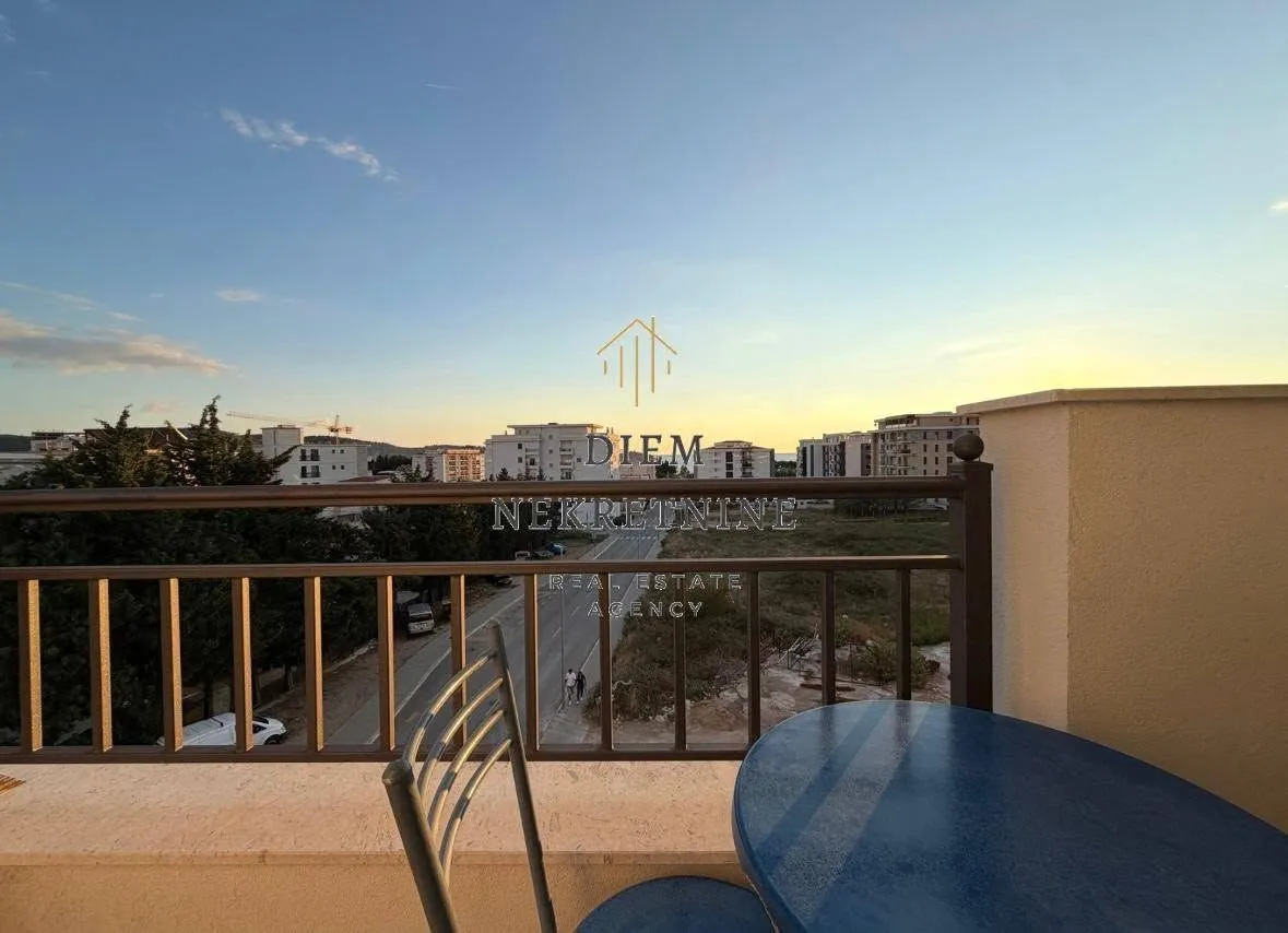 View from the terrace overlooking surrounding buildings and neighborhood.