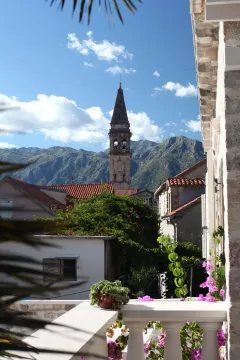 View from the terrace overlooking the old town and mountains. - image 7