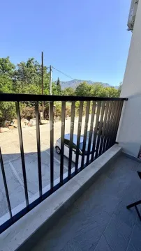 View of the surroundings and parking from the balcony. - image 14