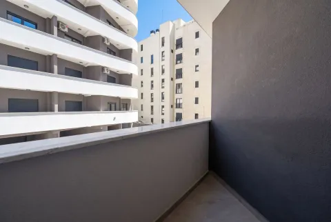 View from the balcony of surrounding buildings. - image 10