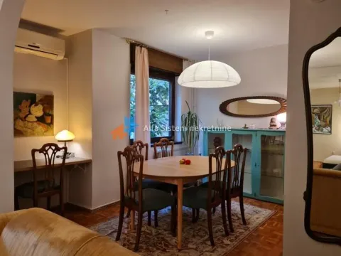 Dining area connected with the living room and a working corner. - image 3