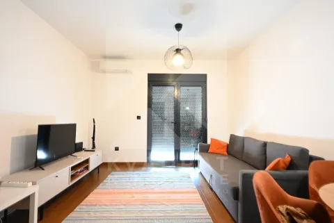 Living room with sofa, TV and access to the terrace. - image 2