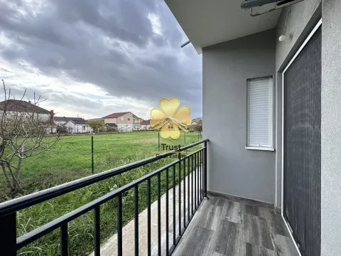 View from the balcony towards the yard and surrounding houses. - image 11