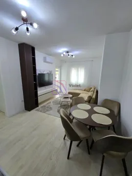 Living room with dining area and furniture. - image 3