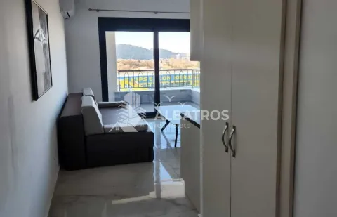 Living room with a sofa and access to the terrace. - image 2