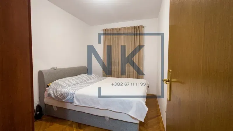 View of the bedroom with a double bed.