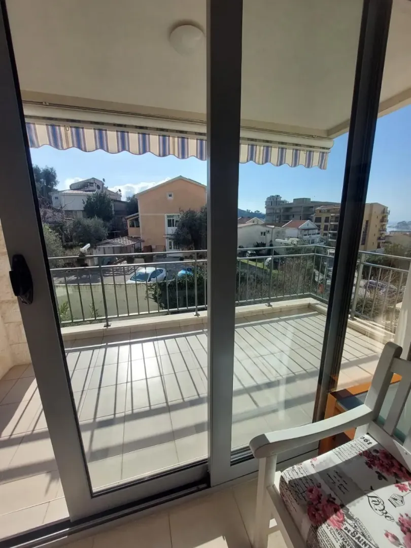 View from the terrace towards nearby buildings and neighborhood.