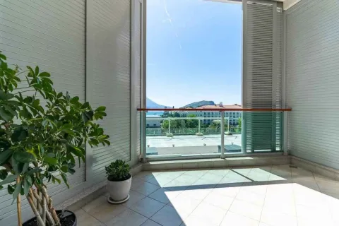 Covered terrace with a view of the surroundings and greenery. - image 11