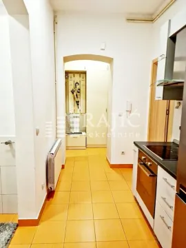 Hallway with a kitchen in light tones. - image 14