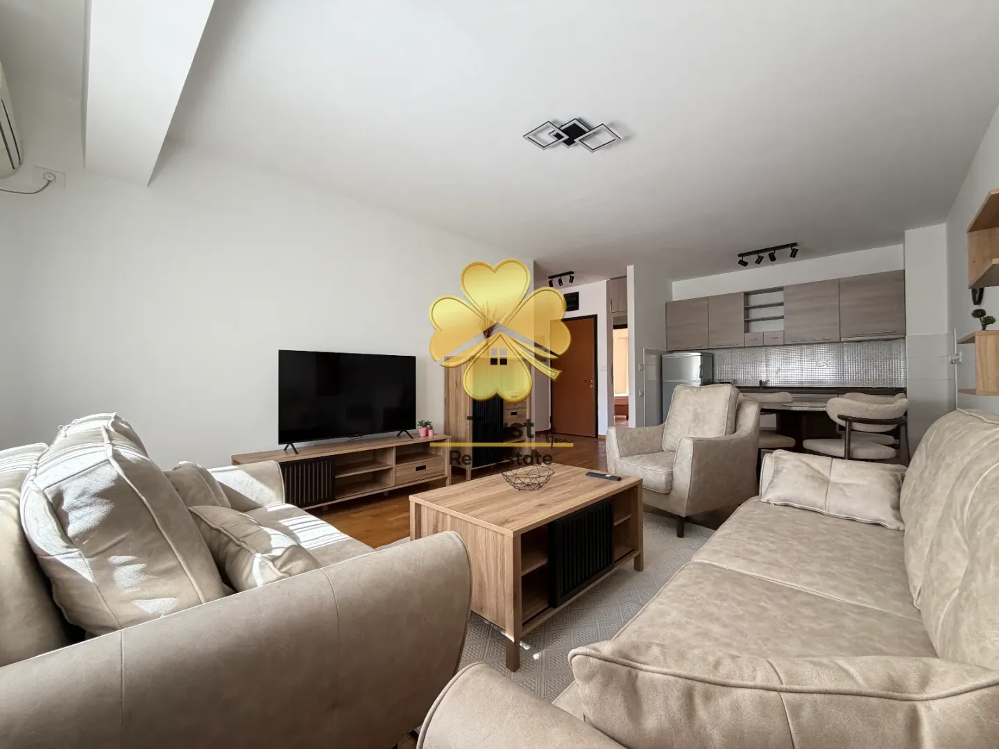 Spacious living room connected to the dining area and kitchen.
