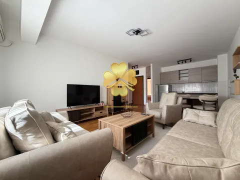 Spacious living room connected to the dining area and kitchen. - image 3