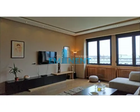 Spacious living room with seating set and television. - image 2