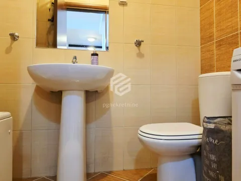 Sale, one bedroom apartment, 57m², City Kvart, Podgorica - image 14