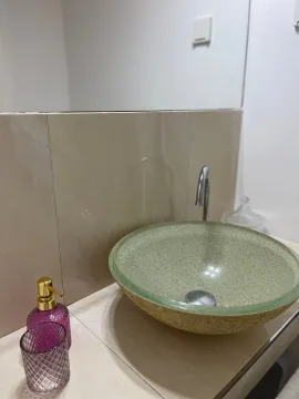 Modern vessel sink with a faucet on a countertop in the bathroom. - image 6