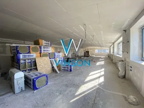 Large space under construction with building materials. - image 5