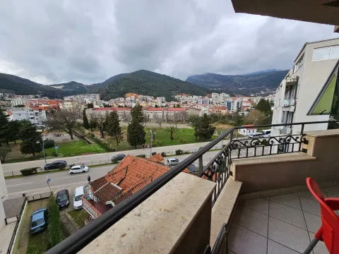 View of the city and surrounding mountains from the balcony. - image 11