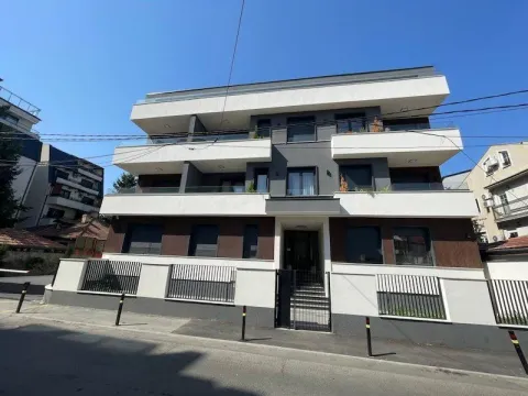 Front view of a modern residential building with terraces and a courtyard. - image 18