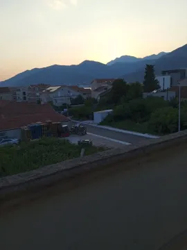 View from the terrace overlooking the neighborhood and mountains in the background. - image 15