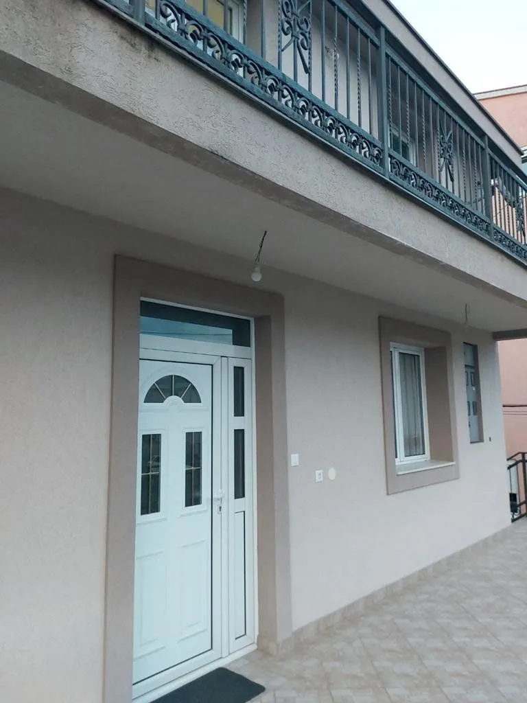View of the entrance door and terrace of the house.