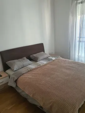 Furnished bedroom with a double bed. - image 5