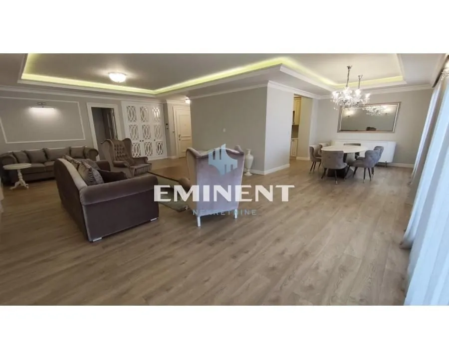Spacious living room connected to the dining area.