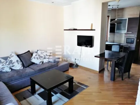 Living room connected to the dining area and kitchen. - image 8