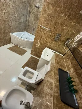 Bathroom equipped with sanitary ware, a shower enclosure and marble tiles. - image 13