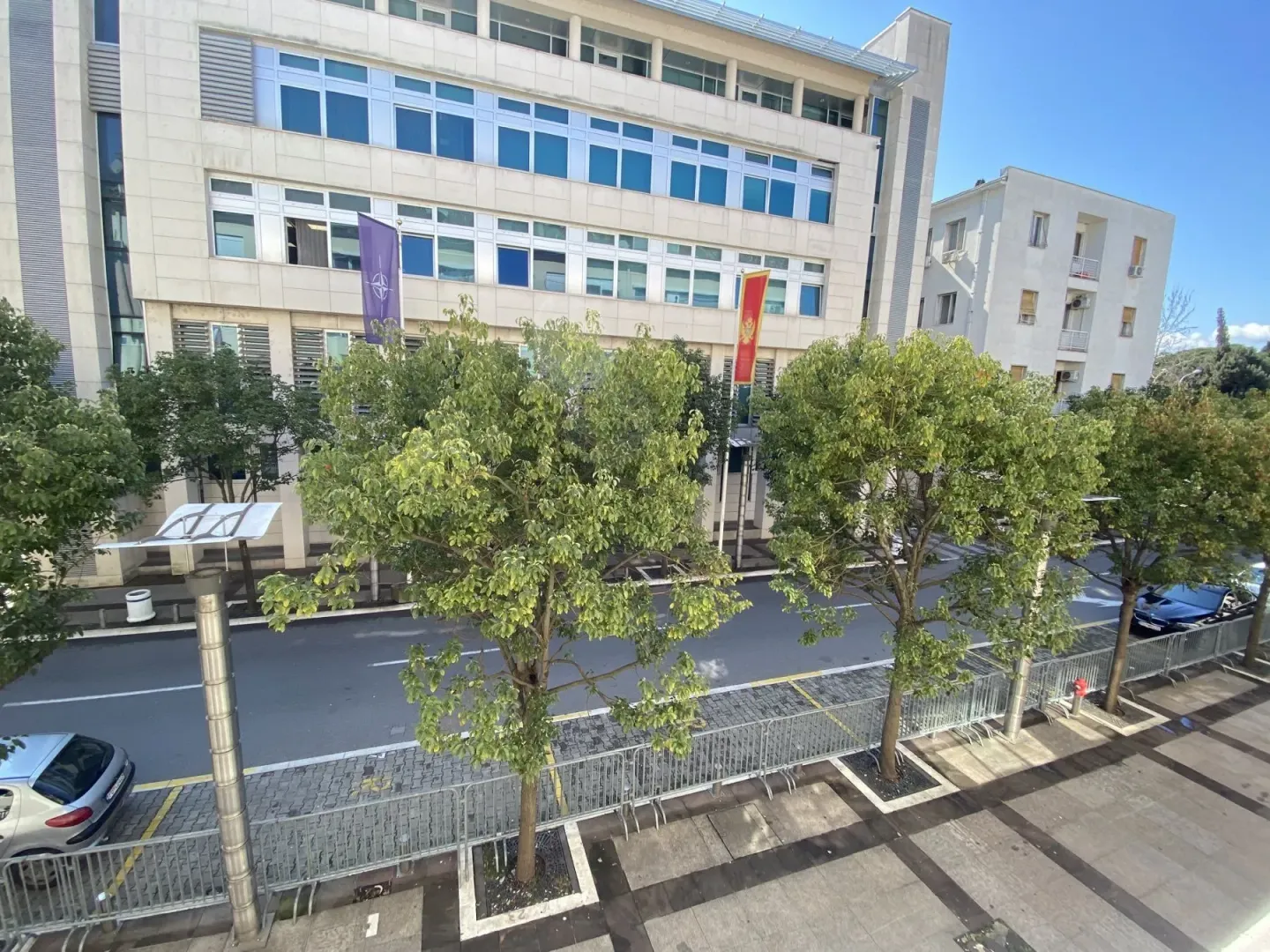 An elevated view of the street and surrounding buildings.