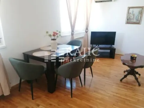 Living room with dining area and seating furniture. - image 2