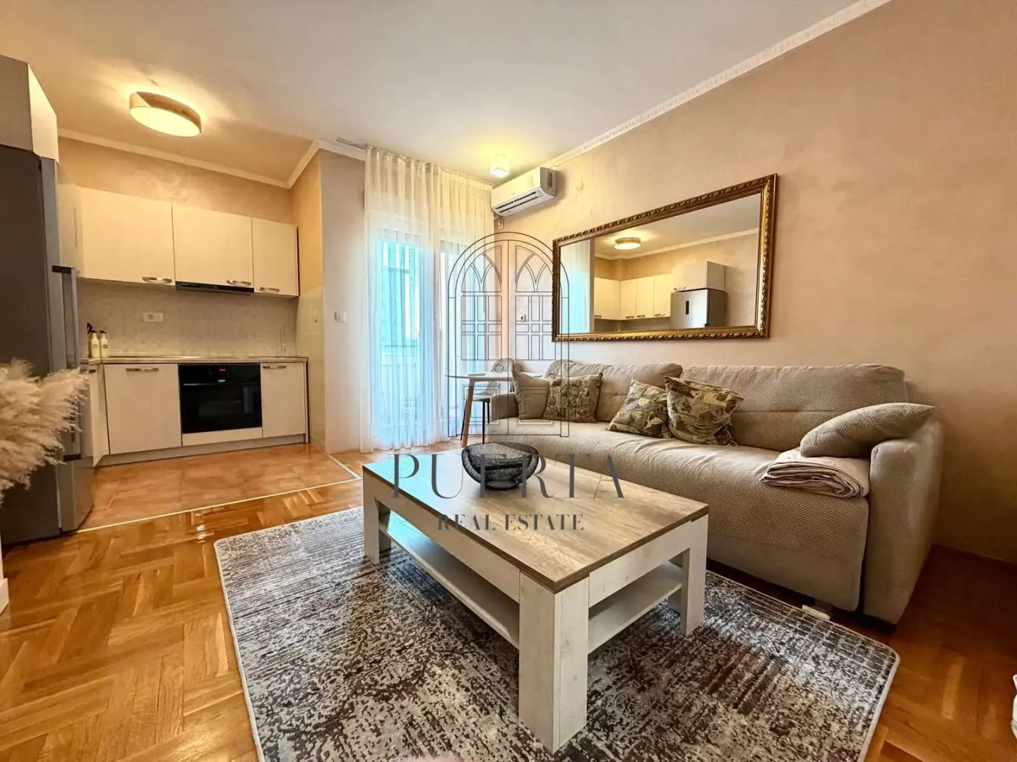 Living room connected with the kitchen and dining area.
