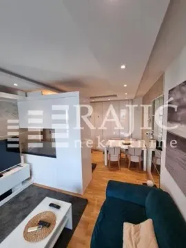 Modern and bright living room with a dining area. - image 3