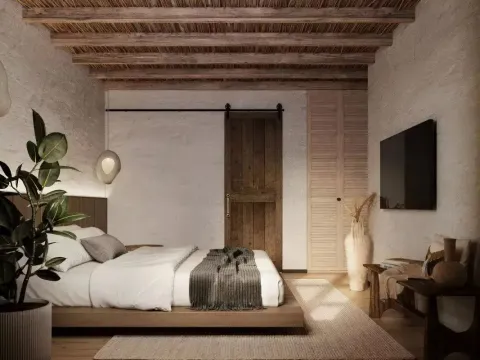 Rustična spavaća soba sa bračnim krevetom, drvenim gredama na plafonu i TV-om na zidu. - image 13