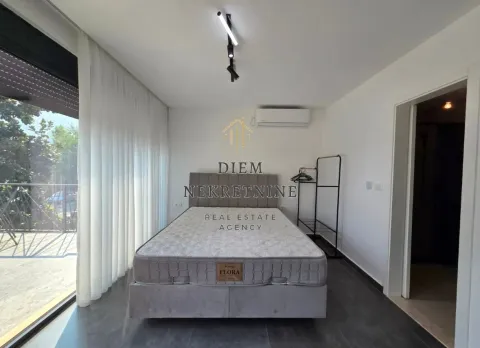 Modern bedroom with a double bed and access to the terrace. - image 10