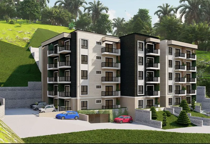 Spoljašnji izgled moderne stambene zgrade sa terasama i uređenim dvorištem.