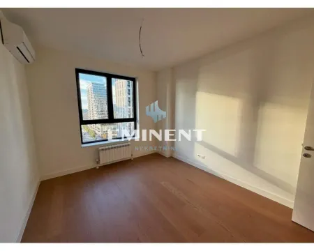Empty room with hardwood flooring and an air conditioner. - image 11