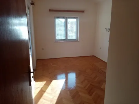 Empty room with parquet flooring. - image 28