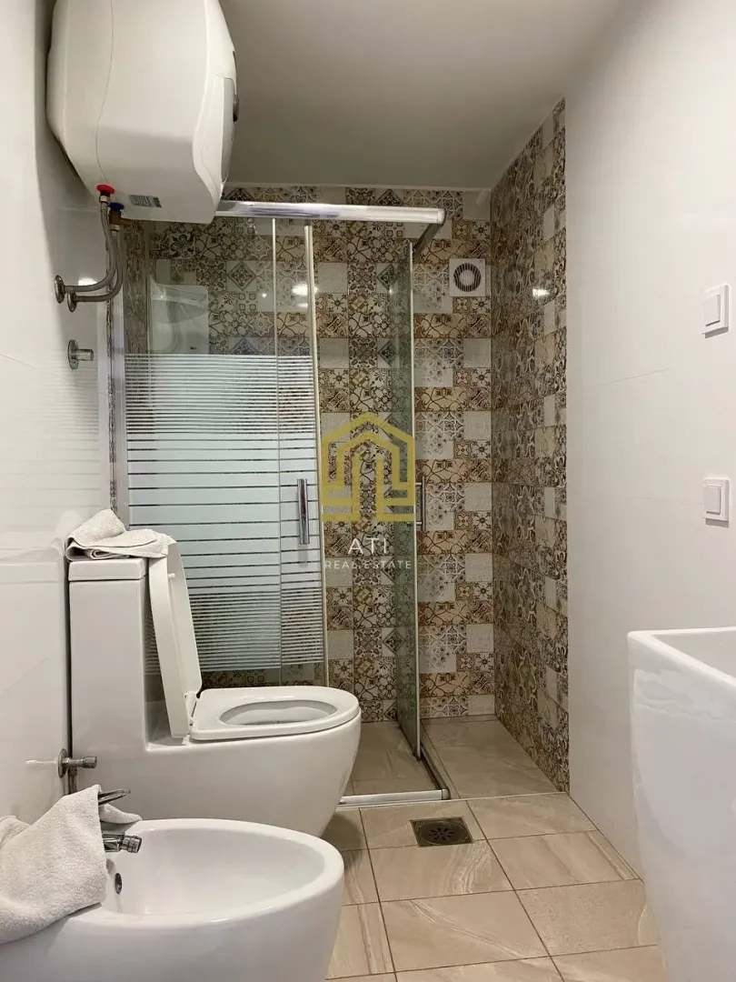 View of a modern bathroom equipped with a shower cabin.