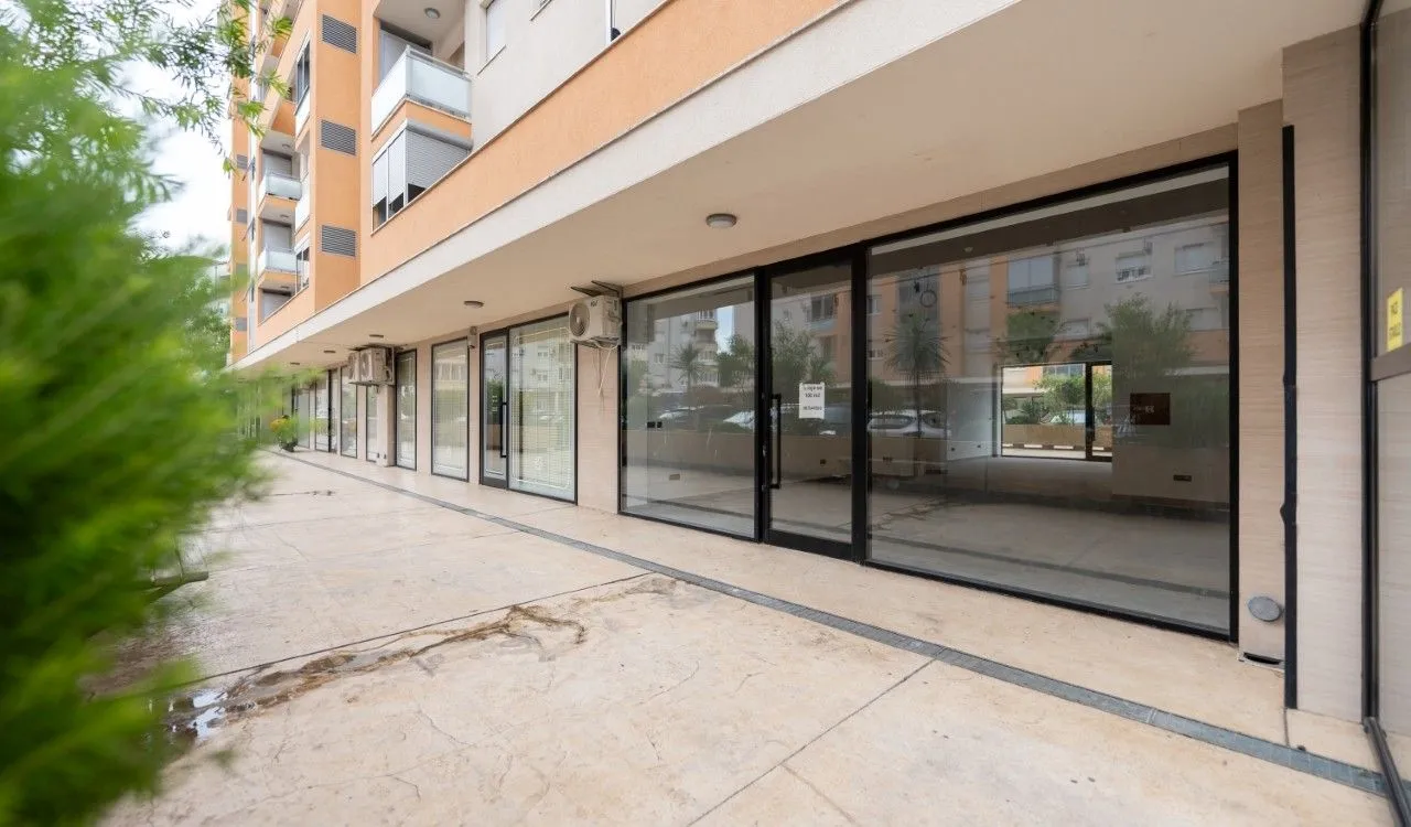 Exterior view of the commercial space on the ground floor of a residential building.