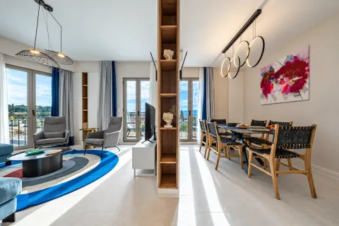 Spacious living room with dining area and terrace access. - image 6