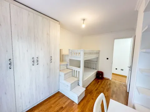 Children's bedroom with a bunk bed and a fitted wardrobe. - image 13