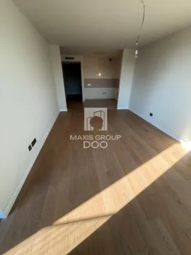 Empty room with hardwood floors and white walls in an apartment. - image 4