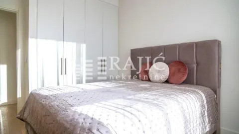 Bedroom with a double bed and a built-in wardrobe. - image 7