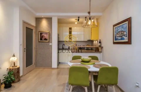 Dining area connected to the kitchen and living room. - image 3