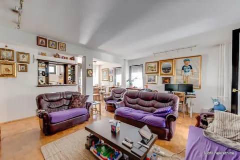 Living room with leather sofas and wooden flooring. - image 3