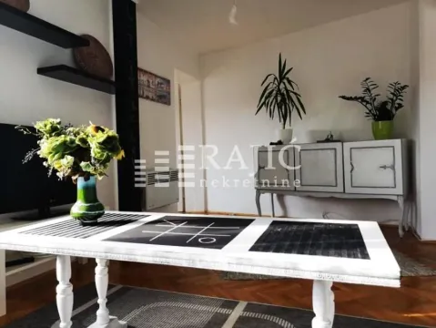 Living room with furniture and dining table. - image 2