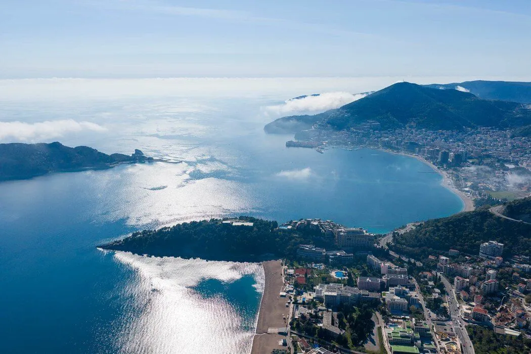 Aerial view of the coastline and sea.