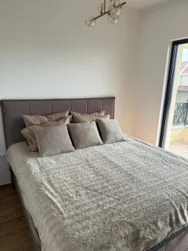 Furnished bedroom with a double bed and access to the terrace. - image 7