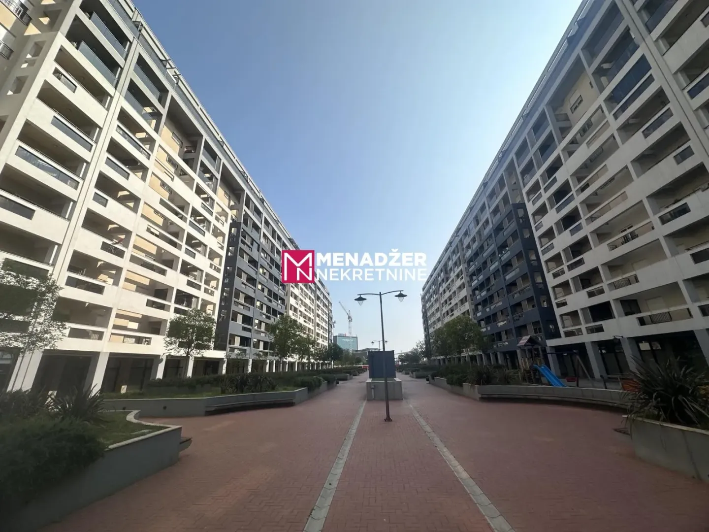 View of the courtyard and facade of residential buildings.