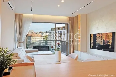 Modern living room with sofa and city view. - image 2