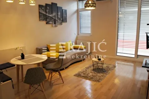 Living room with dining area and modern furniture. - image 20